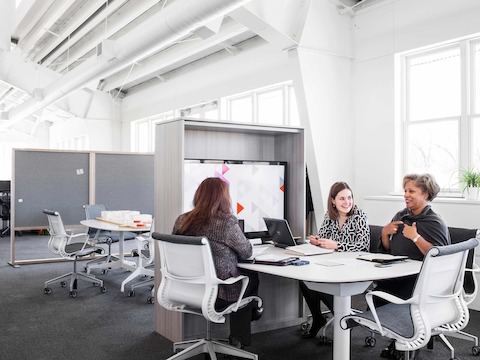 This Cove setting, a group space adjacent to the North American Marketing team's individual workstations, allows people to assemble and engage with one another for a short period of time. This Cove setting, a group space adjacent to the North American Marketing team's individual workstations, allows people to assemble and engage with one another for a short period of time.